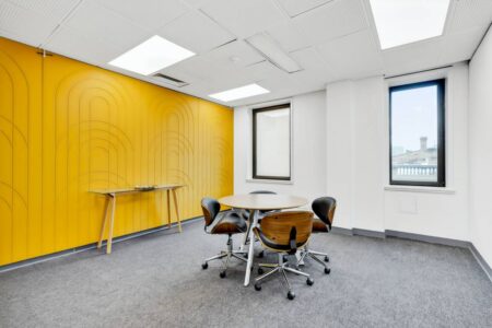 4-seat-meeting-table-panelled-walls-Spot-Coworking-l