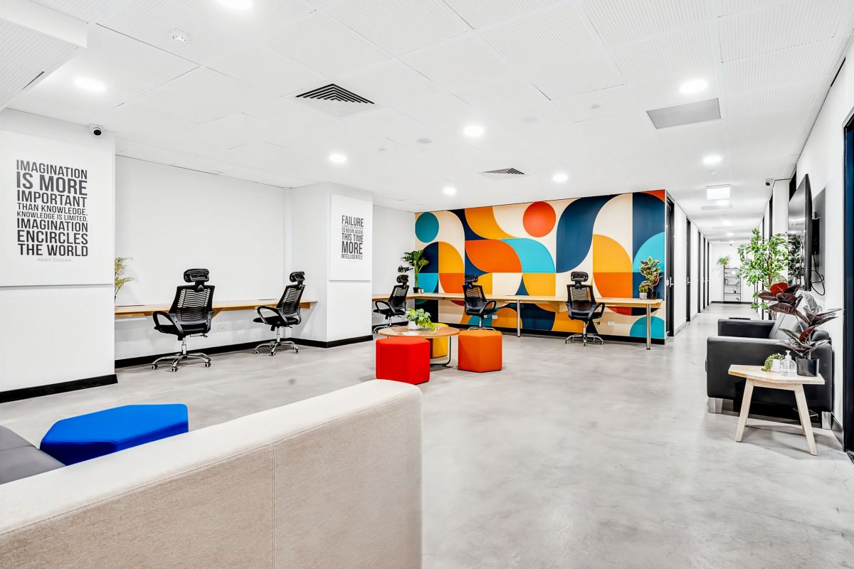 Basement Grand Opening 2 basement hot desks common area Spot Coworking l
