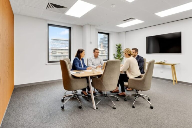 panelled meeting room with people l